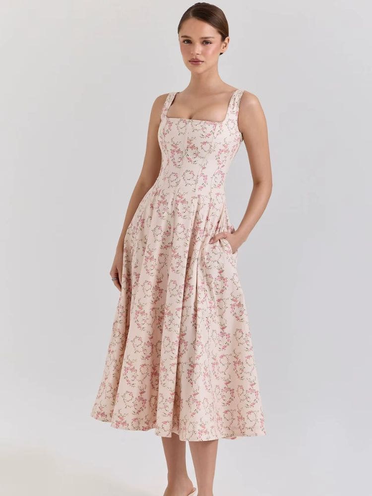 Modelo usando vestido midi floral romântico visto de frente - Moda Origem