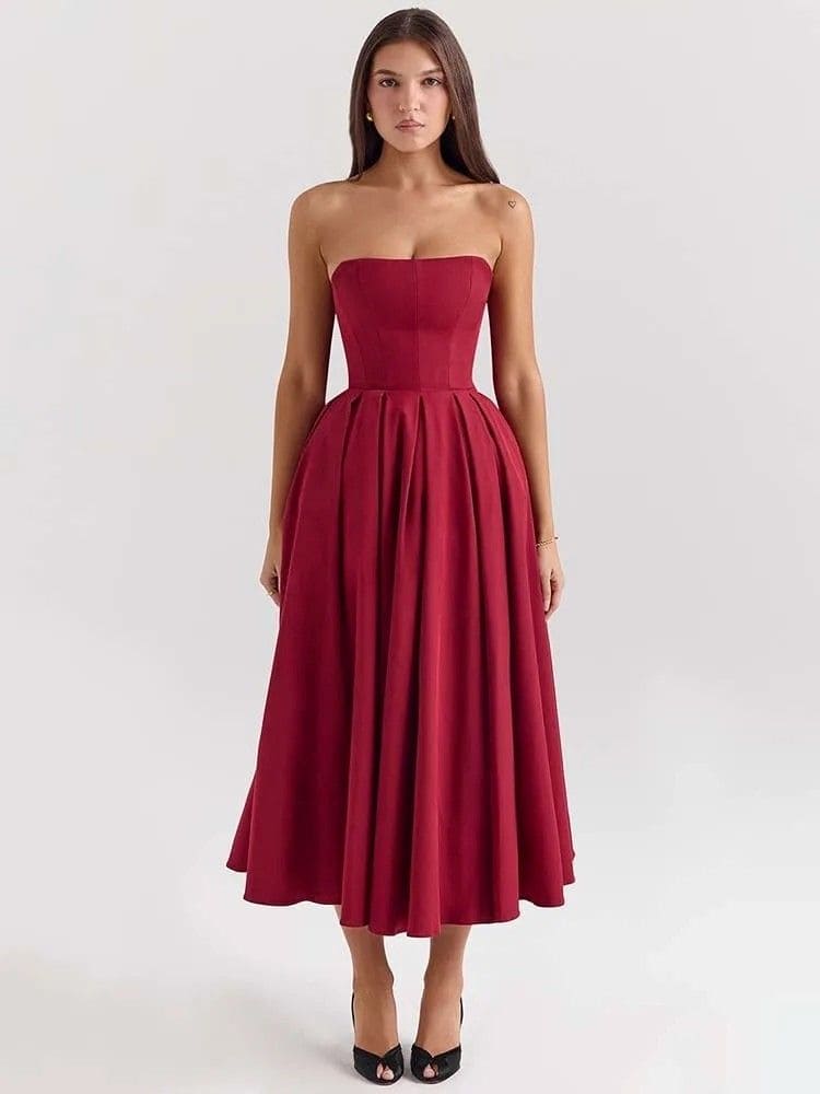 Vestido midi tomara que caia usado em festa sofisticada -Moda Origem