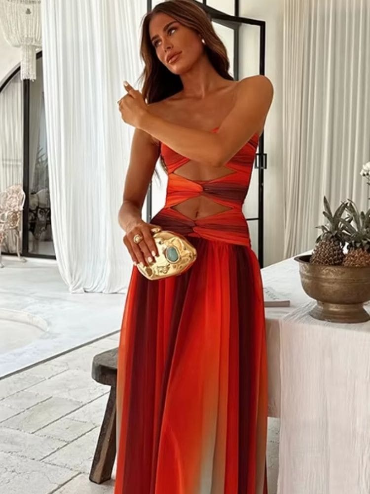 Detalhe do decote aberto do Vestido Laranja Tomara que Caia Verão 2026, mostrando acabamento e design sofisticado – Moda Origem