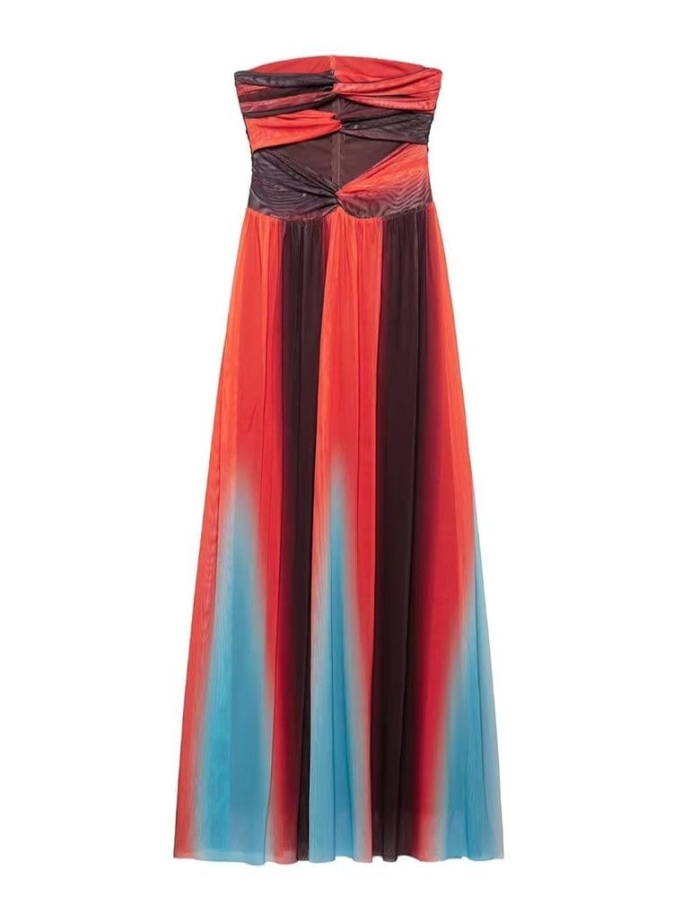 Vestido Laranja Tomara que Caia Verão 2026 em movimento, mostrando fluidez da saia e elegância do look – Moda Origem