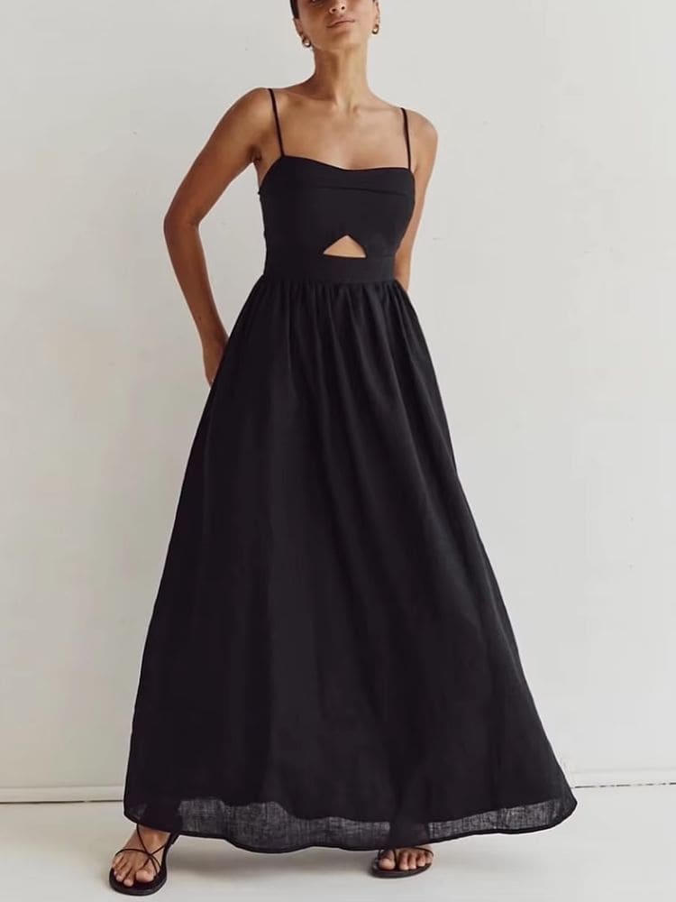 Modelo mostrando vestido longo preto de algodão de lado, destacando caimento – Moda Origem